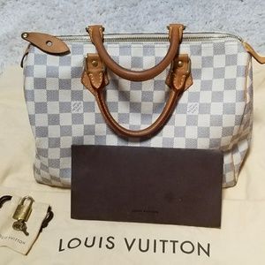 Speedy 35 Louis Vuitton authentic, slightly used .